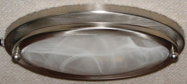 Oval lights off with glass