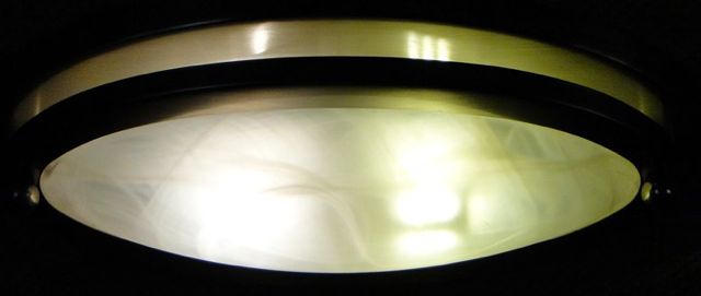Oval lights on with glass